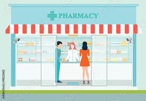Female pharmacist at the counter in a pharmacy.
