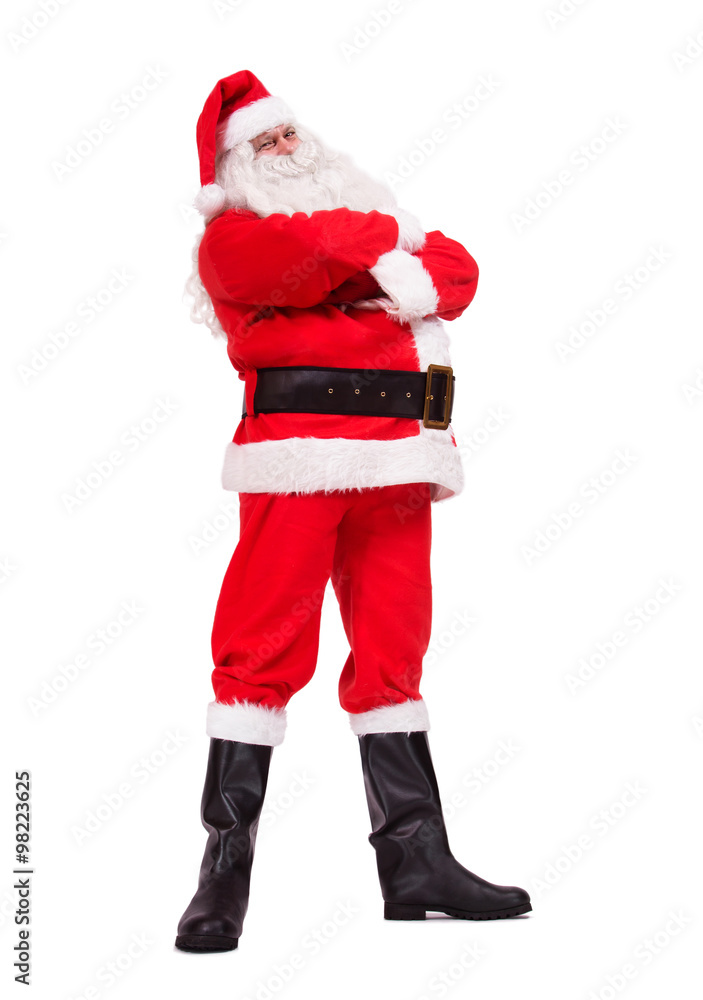 Santa Claus stands with his arms crossed isolated on white background Santa Claus stands with his arms crossed isolated on white background