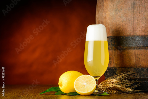 Radler beer glass and lemon photo