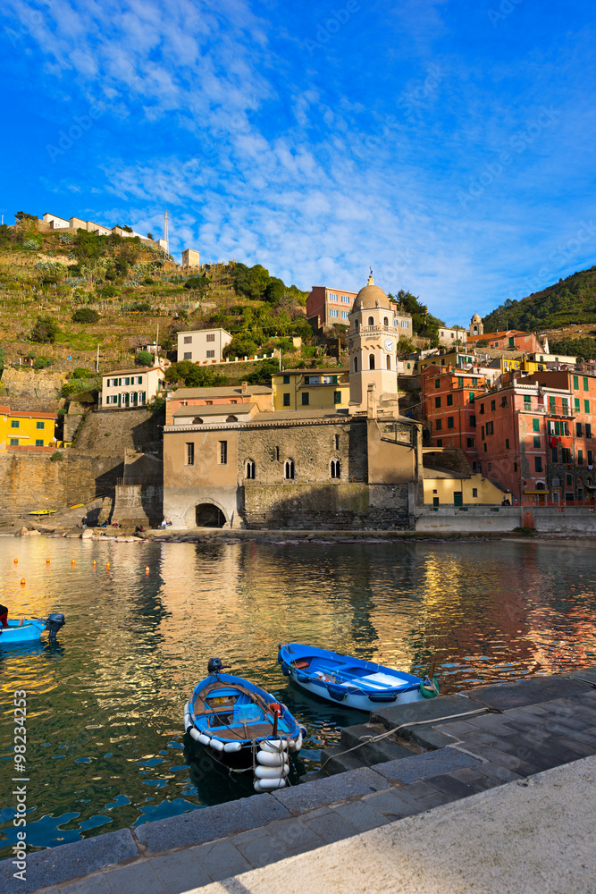 Vernazza Liguria Italy / The ancient village of Vernazza, the harbor and the church, cinque terre national park in Liguria Italy. UNESCO world heritage site
