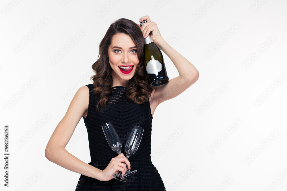 Beautiful smiling woman with bottle of champagne and two glasses Beautiful smiling woman with bottle of champagne and two glasses