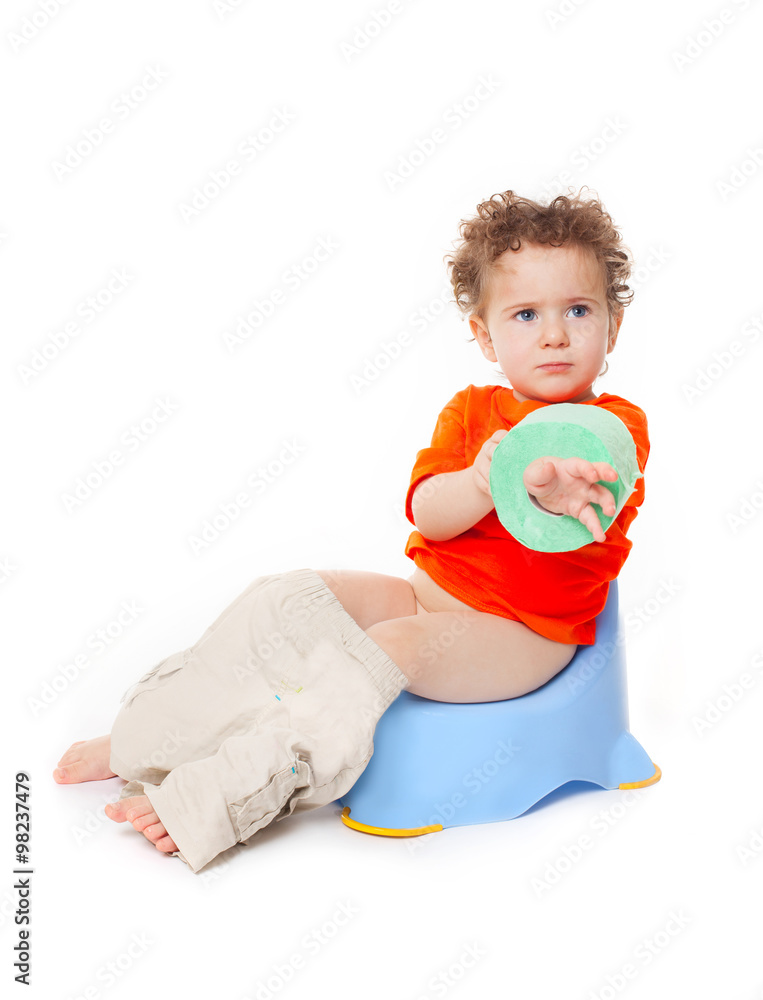 baby on potty with lavatory paper Stock Photo | Adobe Stock