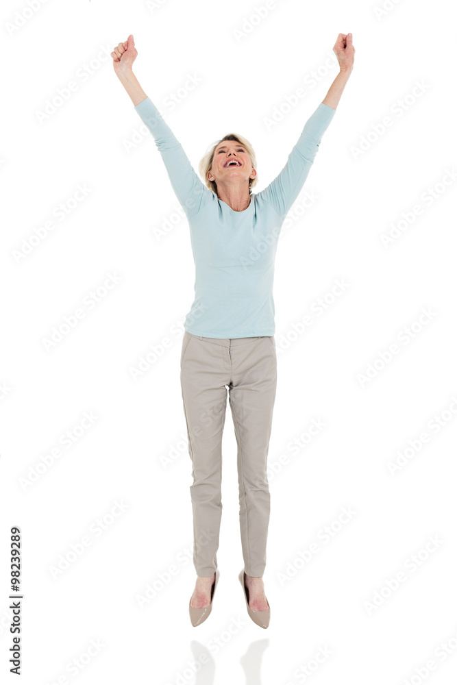 happy senior woman jumping happy senior woman jumping