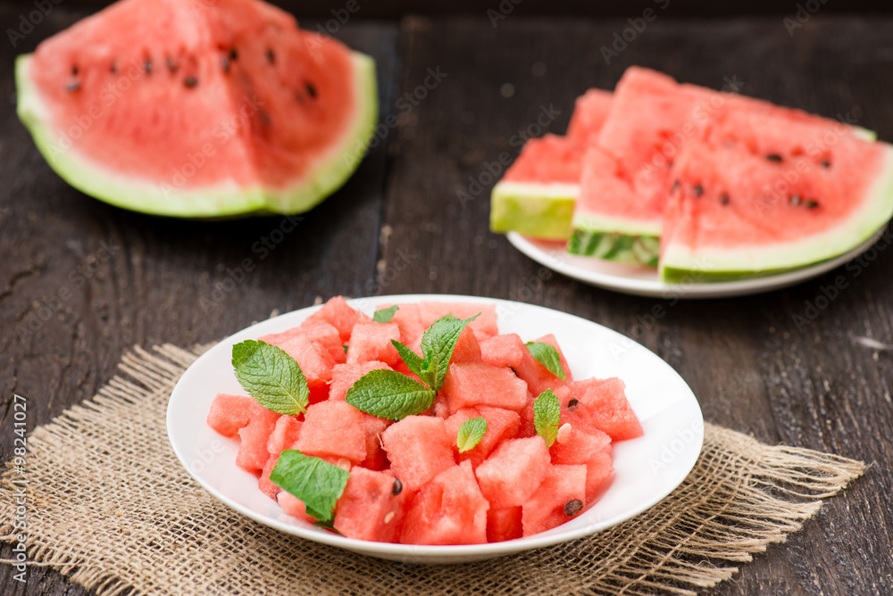 watermelon slices cut on the plate with mint