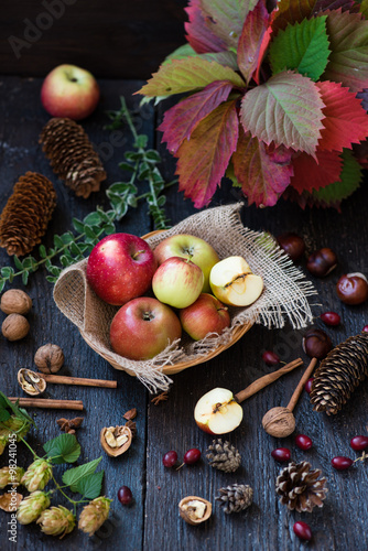 Wallpaper Mural Fresh apples with autumn leaves on wooden table Torontodigital.ca