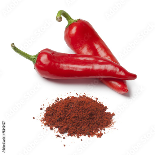 Fresh red sweet pepper and paprika powder photo