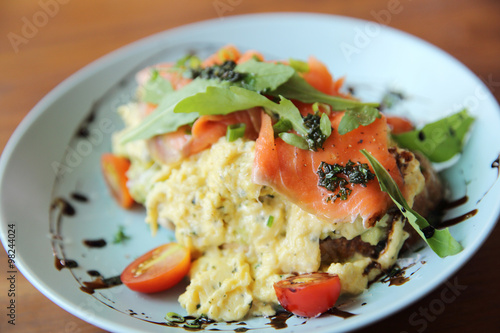 Scrambled eggs with smoked salmon and avocado