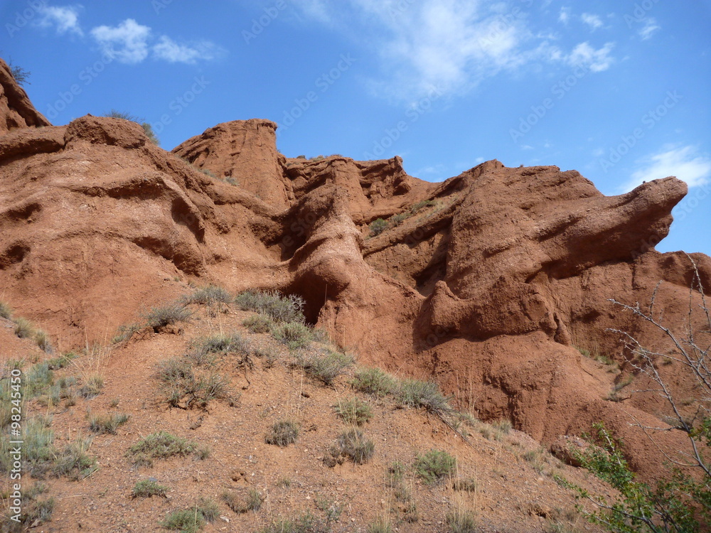 red rock formations in Canyon Konorchek in Kyrgyzstan red rock formations in Canyon Konorchek in Kyrgyzstan