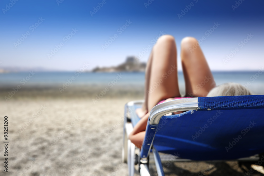 Fototapeta premium summer woman legs and chair 