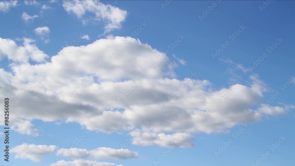 Loop features time lapse motion clouds backed by a beautiful blue sky. Loop features time lapse motion clouds backed by a beautiful blue sky.