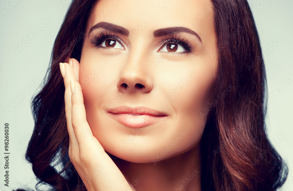 portrait of beautiful young woman looking up portrait of beautiful young woman looking up