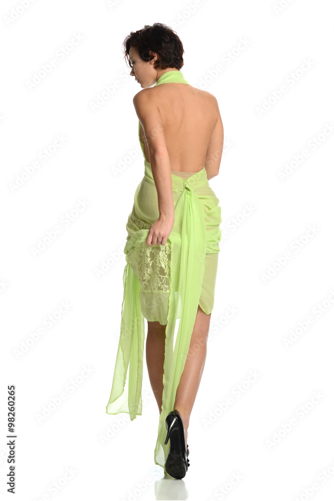 Fototapeta premium Young woman wearing a green dress