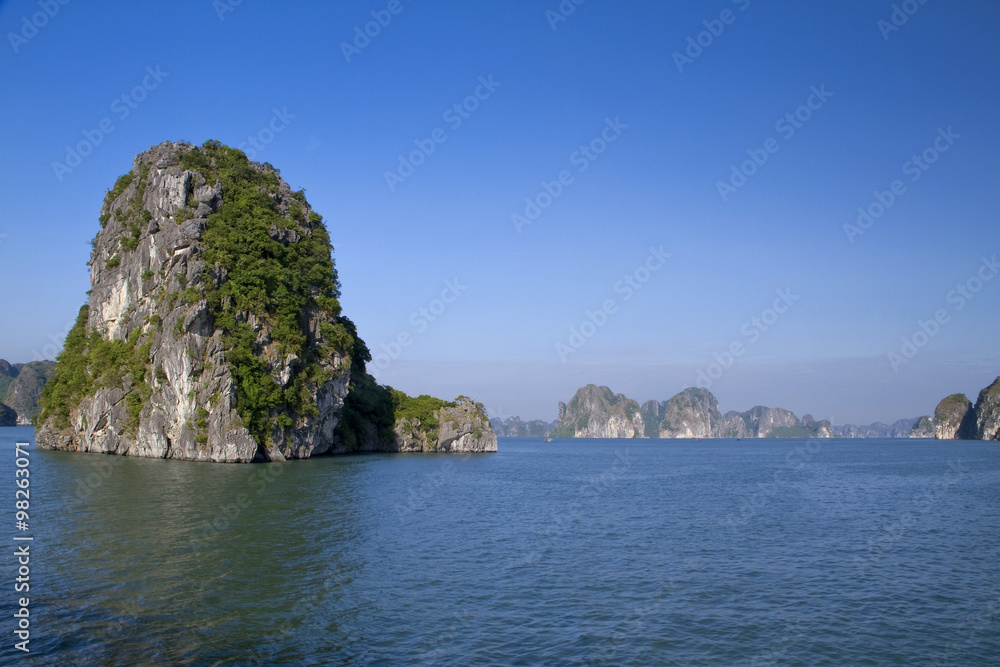 Beautiful vista with rocks and blue sky in Vietnam's Ha Long Bay Beautiful vista with rocks and blue sky in Vietnam's Ha Long Bay