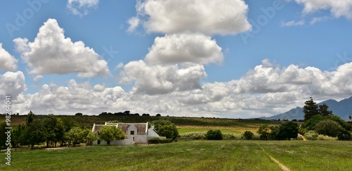 Landscape with Farm House and clouds in the sky