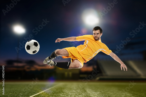 Soccer Player kicking the ball