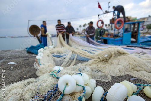 Fishermen fishing net is repairing photo