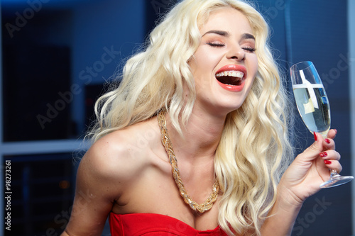 party, drinks, christmas, New Year concept - smiling woman in re