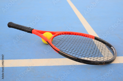 The image of tennis ball and tennis racket