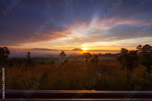 Misty morning sunrise at Thung Salang Luang National Park Phetch photo