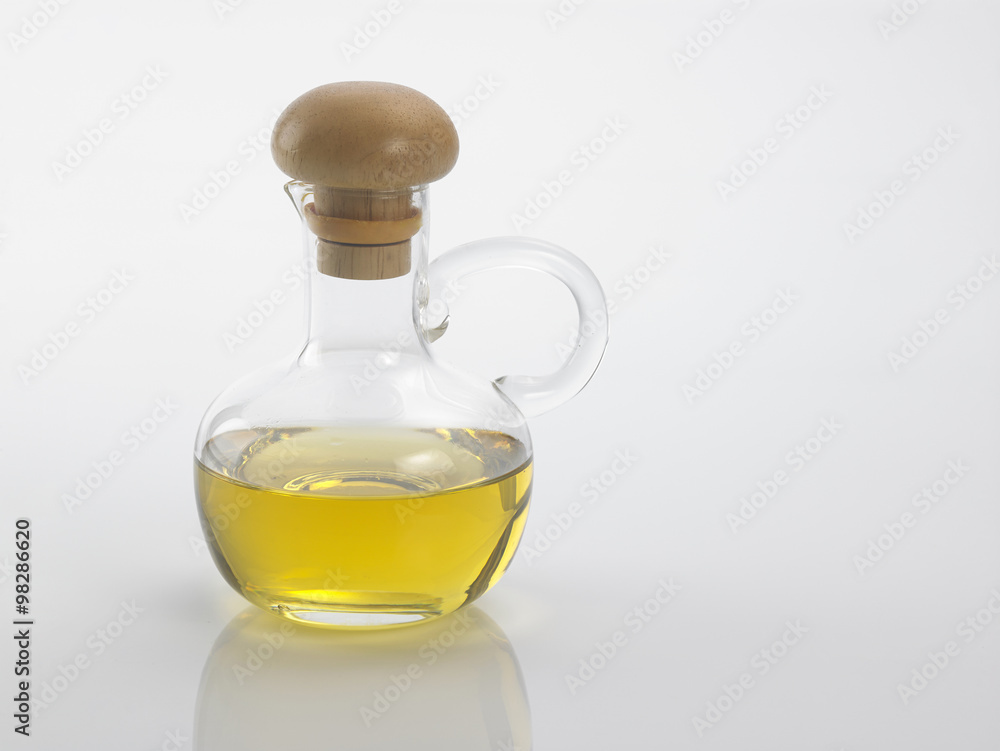bottle with yellow liquid bottle with yellow liquid