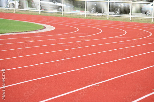 running track, Red treadmill in sport field. © smolaw11