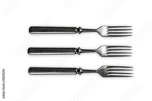 Silver forks on white background