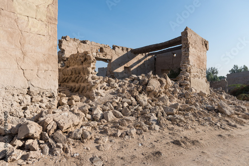 Coral house and broken wall, Old Ras Al Khaimah abandoned ghost town, Al Jazirah Al Hamra photo