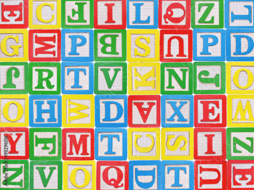 Wooden alphabet blocks background