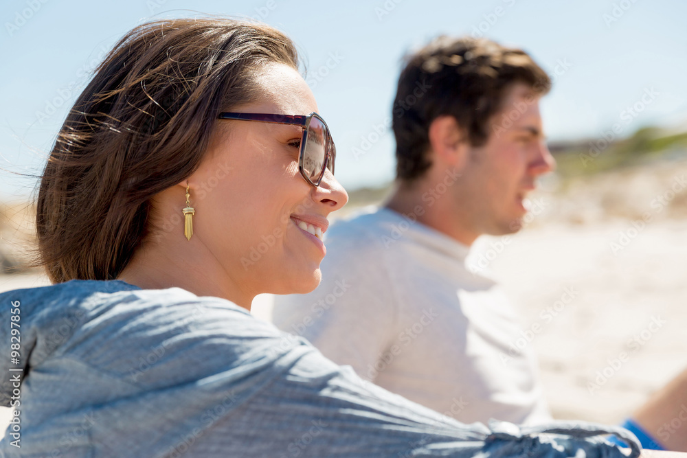 Fototapeta premium Portrait of young woman on beach