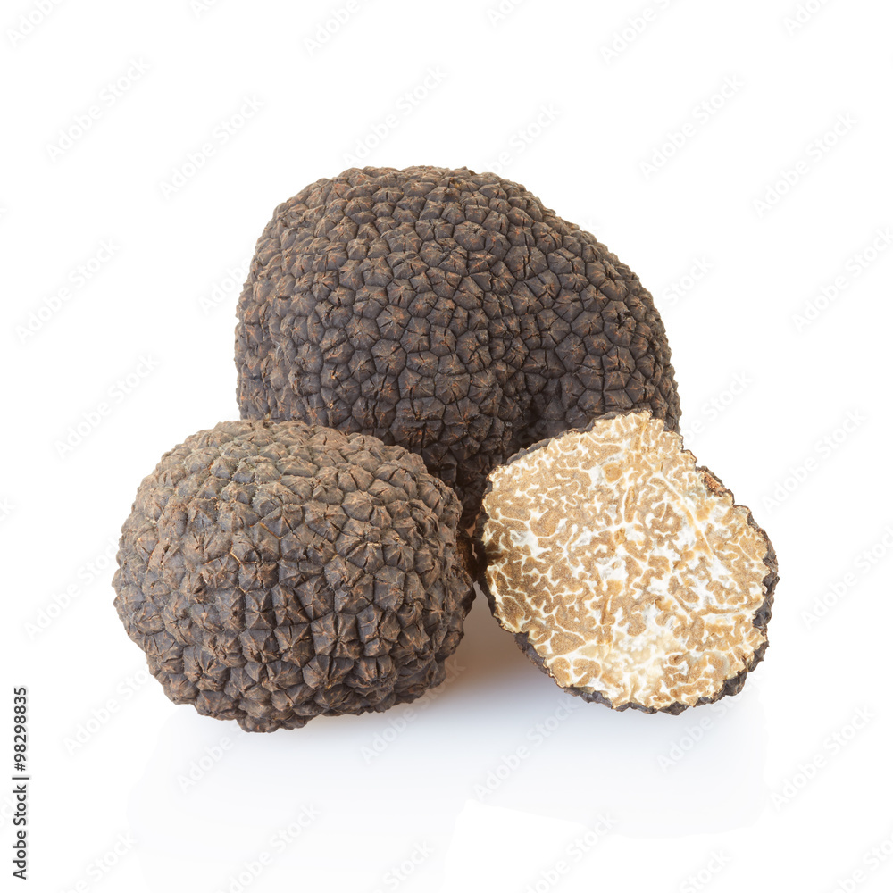 Black truffles and half isolated on white, clipping path Black truffles and half isolated on white, clipping path