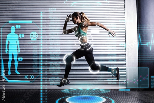 Composite image of muscular woman running in exercise room