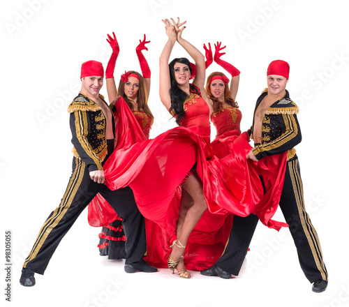 dancer team wearing in traditional flamenco dresses