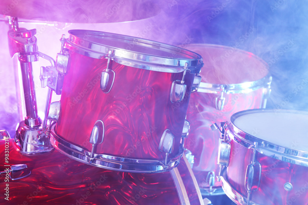Obraz premium Drum set in smoke on a stage
