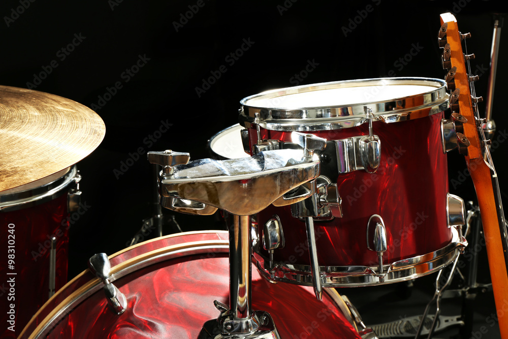 Fototapeta premium Musical instruments on a stage on dark background