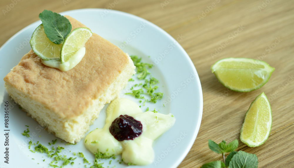 Traditional cake with lime on table Traditional cake with lime on table