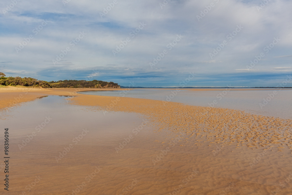 Sandy beach at low tide, Venus Bay, Inverloch, Australia