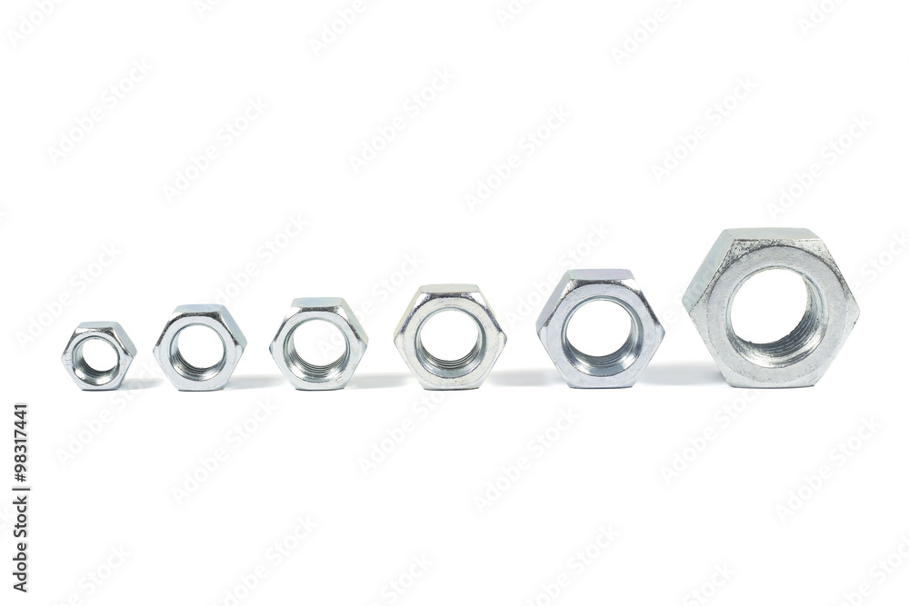 Metal Nuts Lined Up From Smallest To Largest Isolated On White 
