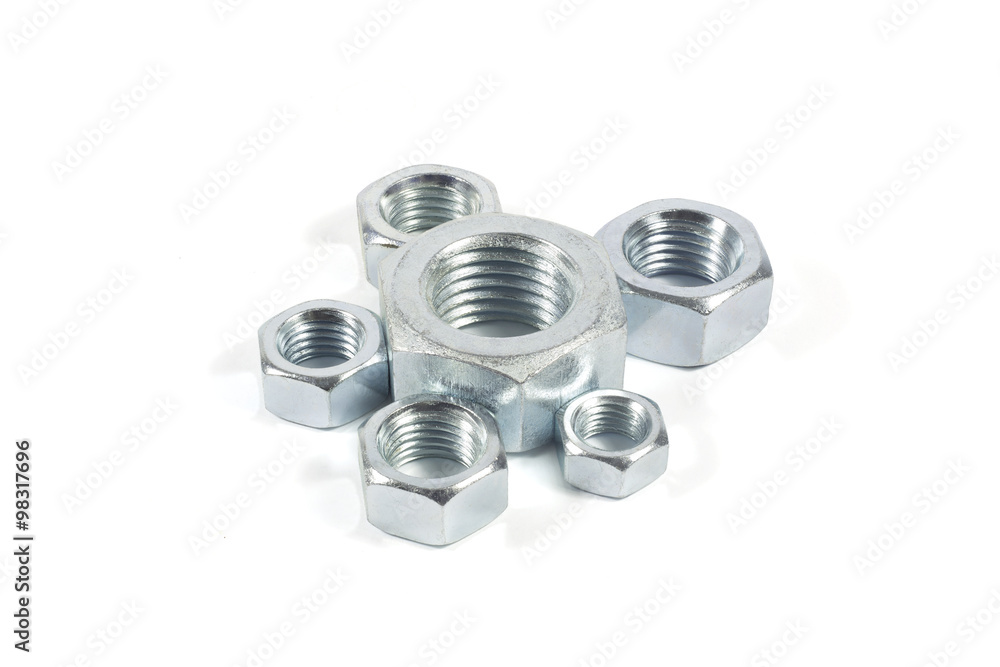 Metal Nuts Of Different Sizes Isolated On White Background Metal Nuts Of Different Sizes Isolated On White Background