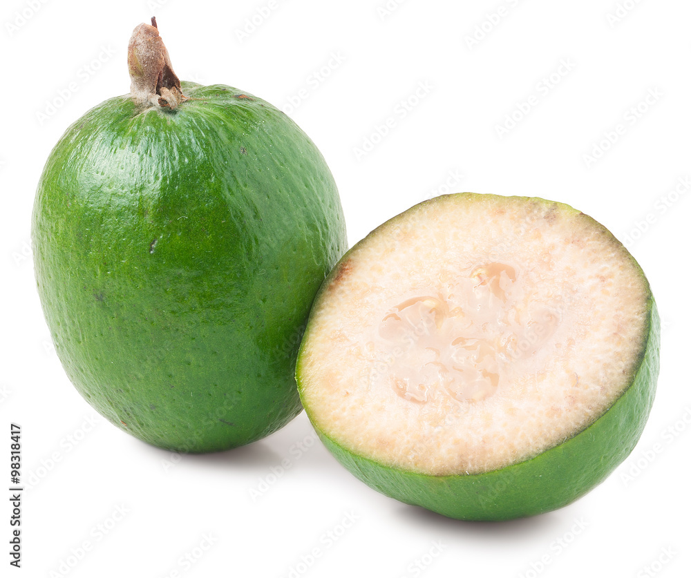 One whole and a half feijoa isolated on white background One whole and a half feijoa isolated on white background