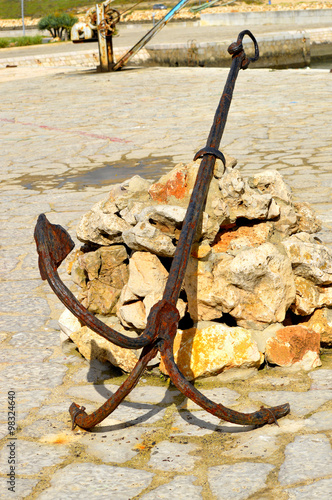 An anchor at the Bensafrim river in Lagos harbour photo