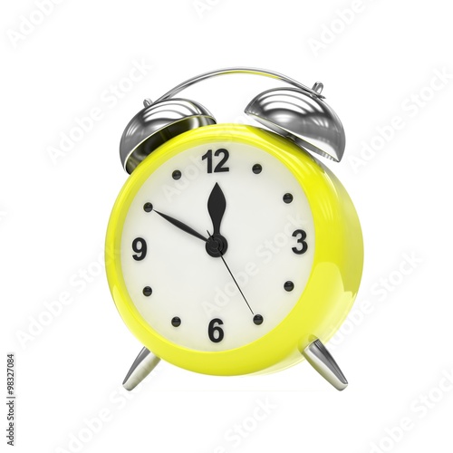 Yellow alarm clock on white