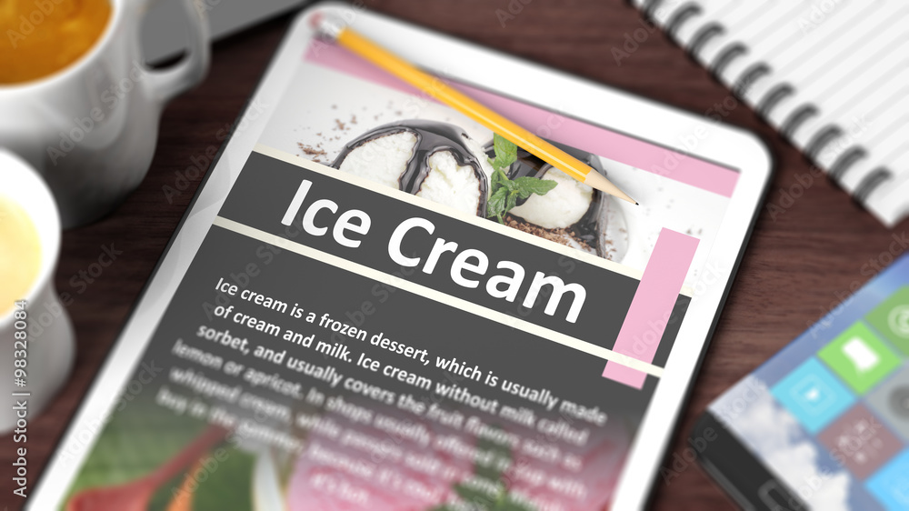 Tabletop with various objects focused on tablet with recipe of Tabletop with various objects focused on tablet with recipe of