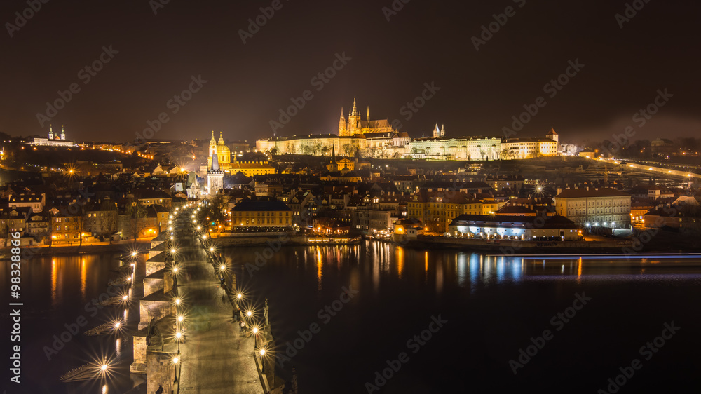 Aerial night view on Charles Bridge and Prague Castle, Czech Republic