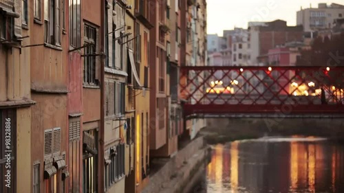 Old river houses in a urban sunset landscape.