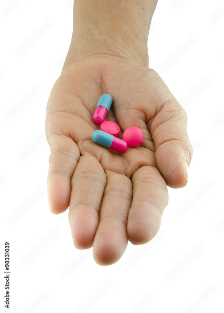 pills capsule on hand outstretched