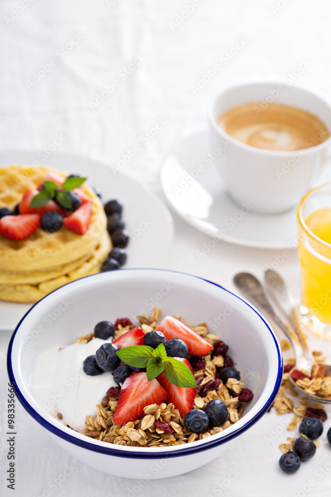 Granola with fresh berries in a bowl Granola with fresh berries in a bowl