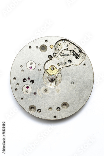 The clock mechanism on a white background