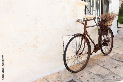 Old rusty bike as a flowerpot