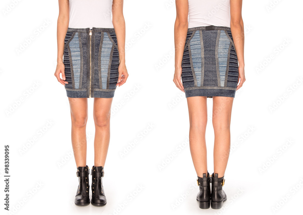 female legs in a skirt and s on a white background female legs in a skirt and s on a white background