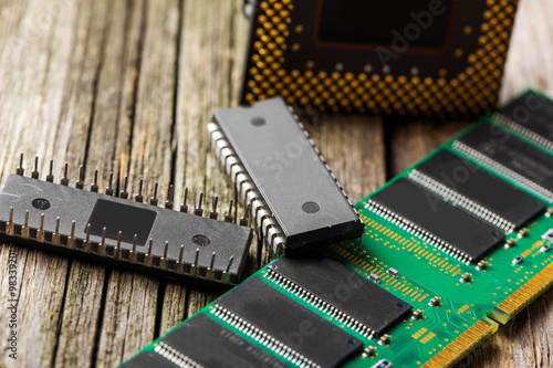 Components for computer over wood desk background